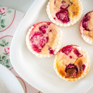 ricotta raspberry tarts on a plate