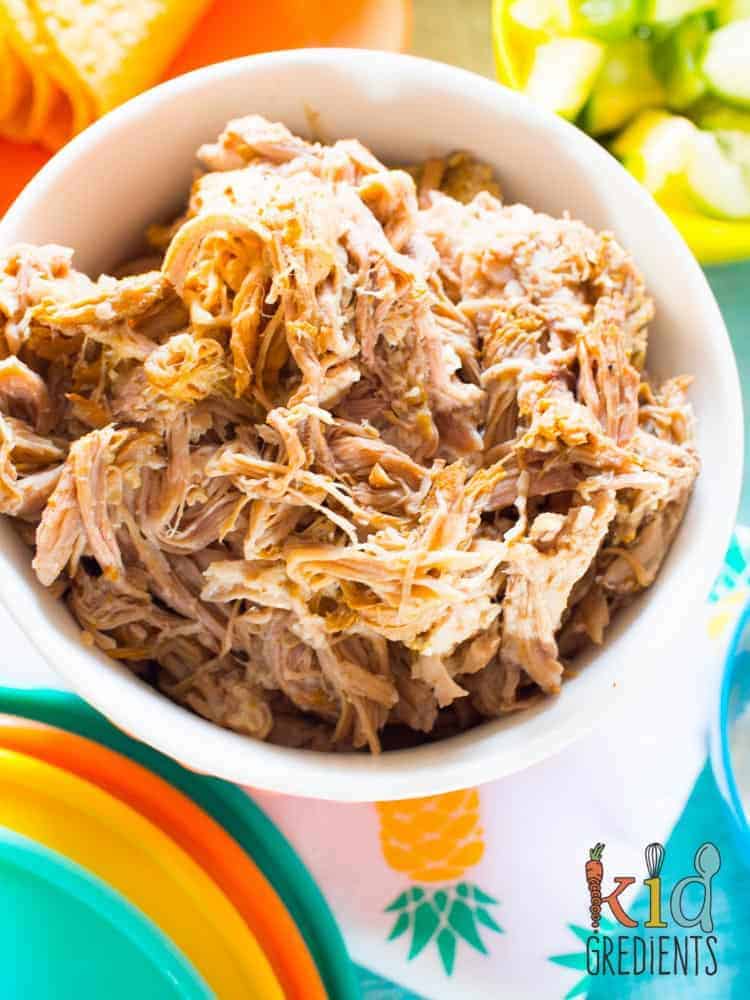 pineapple and lime pulled pork, one of the easiest and tastiest recipes you can make in a slow cooker. Perfect for summer dinners and lunches!