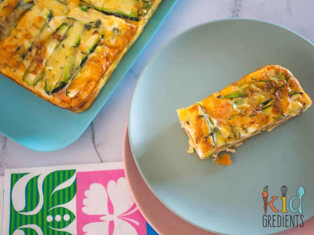 Perfect for breakfast and great in the lunchbox, this sweet potato and zucchini healthy strata bake is jam packed full of veggies.  Kid and freezer friendly.  Great way to start the day with extra veggies!