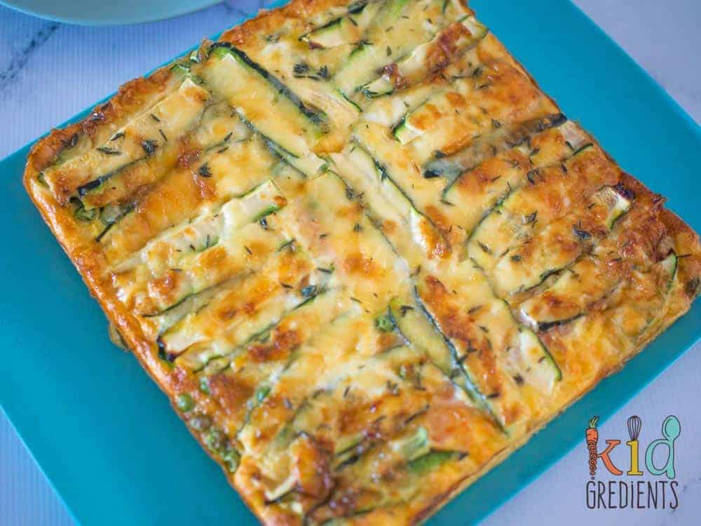 Perfect for breakfast and great in the lunchbox, this sweet potato and zucchini healthy strata bake is jam packed full of veggies.  Kid and freezer friendly.  Great way to start the day with extra veggies!