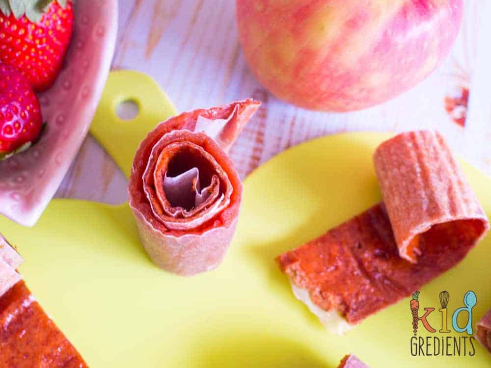 Apple and strawberry fruit leather, no added sugar and no dehydrator needed! Easy to make recipe the kids will love! Perfect in the lunchbox or as a treat after school.