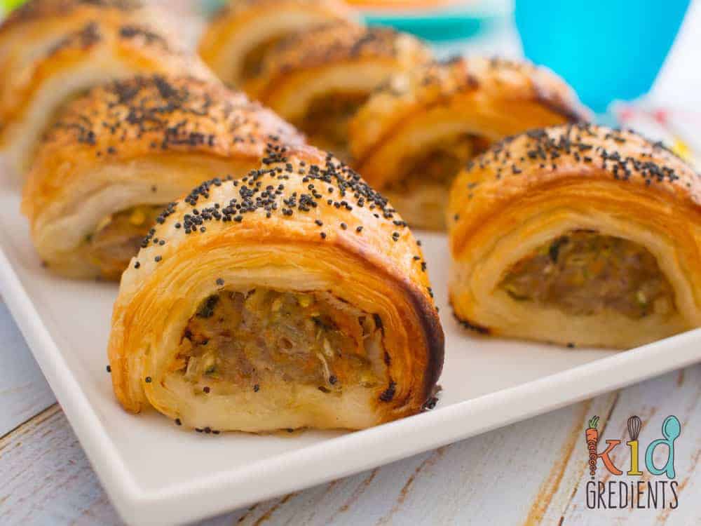 Pork, apple and veggie sausage rolls perfect as a party food and great to have in the freezer! So yummy and filled with hidden veggies.  Easy recipe the kids will love.