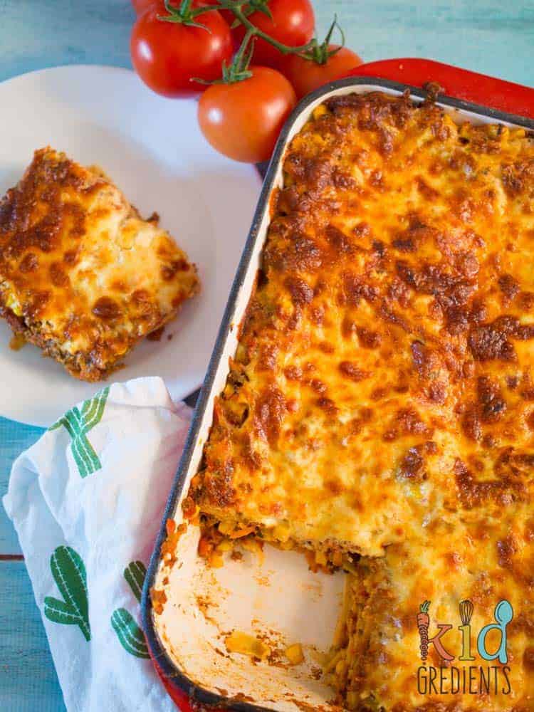 This easy bake veggie packed Mexican lasagna is awesome for filling the kids with veggies! Freezer friendly and super yummy.Simple, but tasty family recipe!