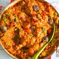 Baked tomato and mini meatball risotto, a kid friendly mid week meal! Risotto with no stirring! Yummy and filled with veggies #kidsfood #familyfood #risotto #baked #meatballs