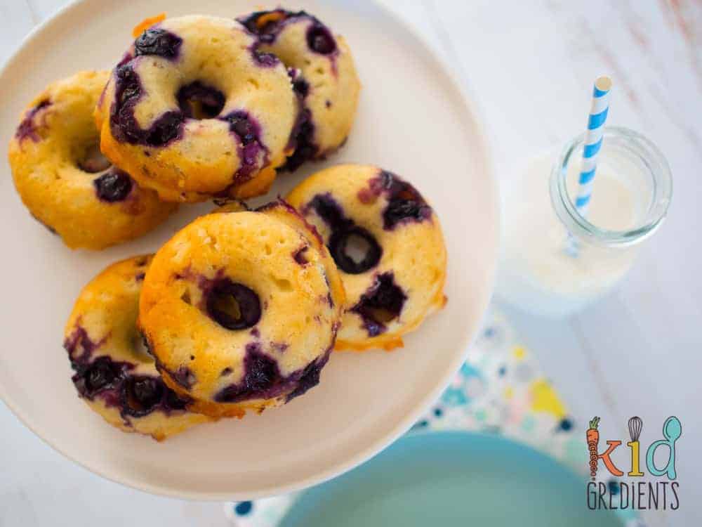baked blueberry yoghurt donuts, the best sugar free donuts you can bake! Delicious and kid friendly! #kidsfood #baked #blueberry #donuts #familyfoo #healthyfood #healthykids