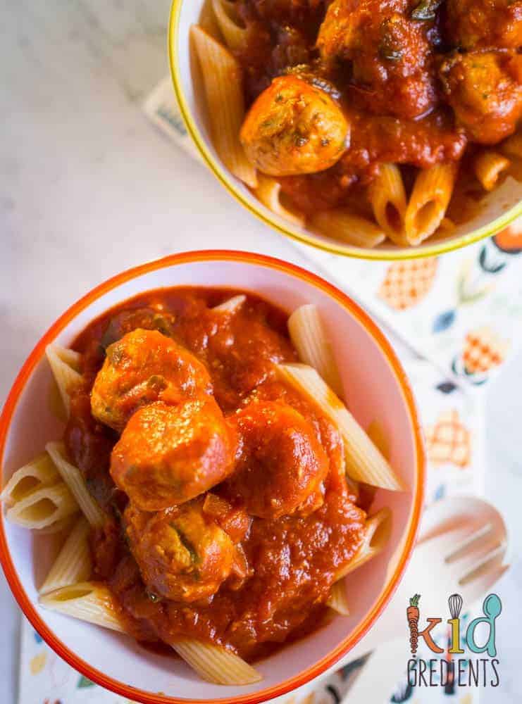 cheesy chicken meatballs with cherry tomato pasta sauce