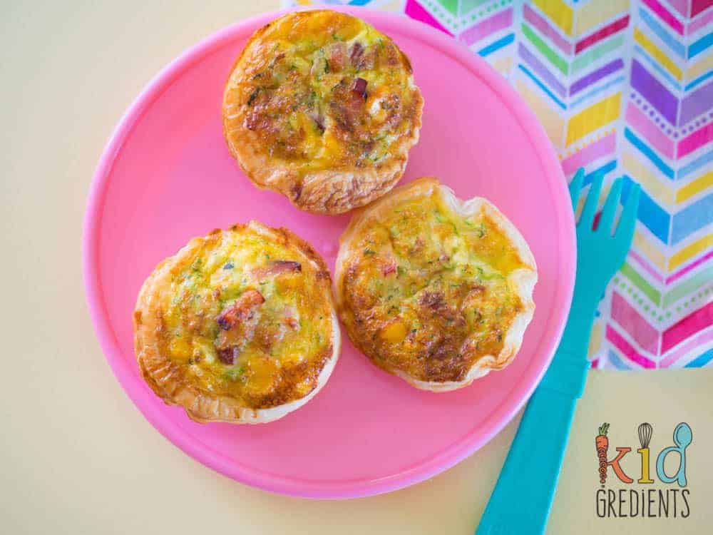 Lunchbox bacon and veggie quiches, three on a plate
