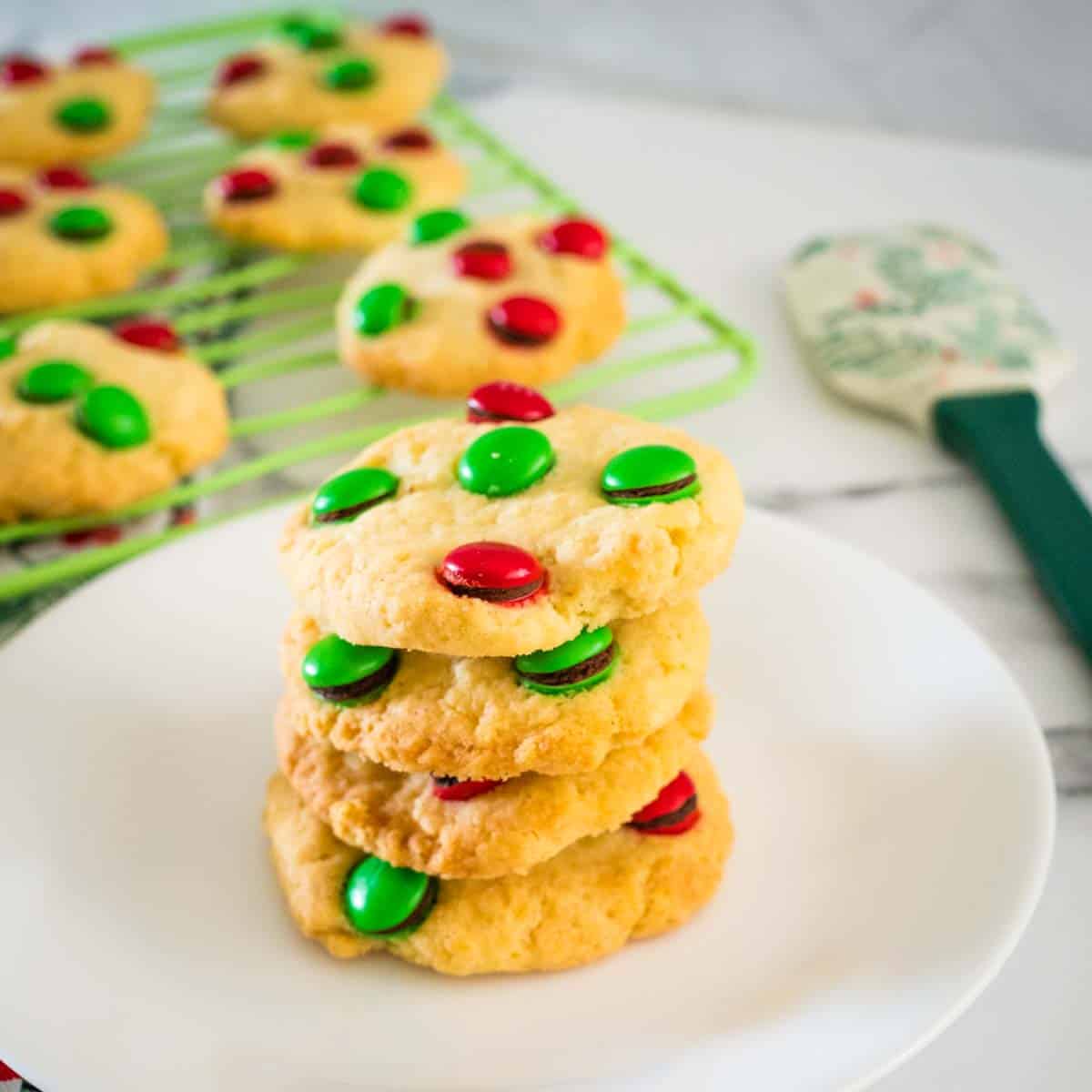 christmas butter cookies on a plate and on a wire rack