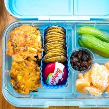 tuna and veggie fritters in a blue lunchbox