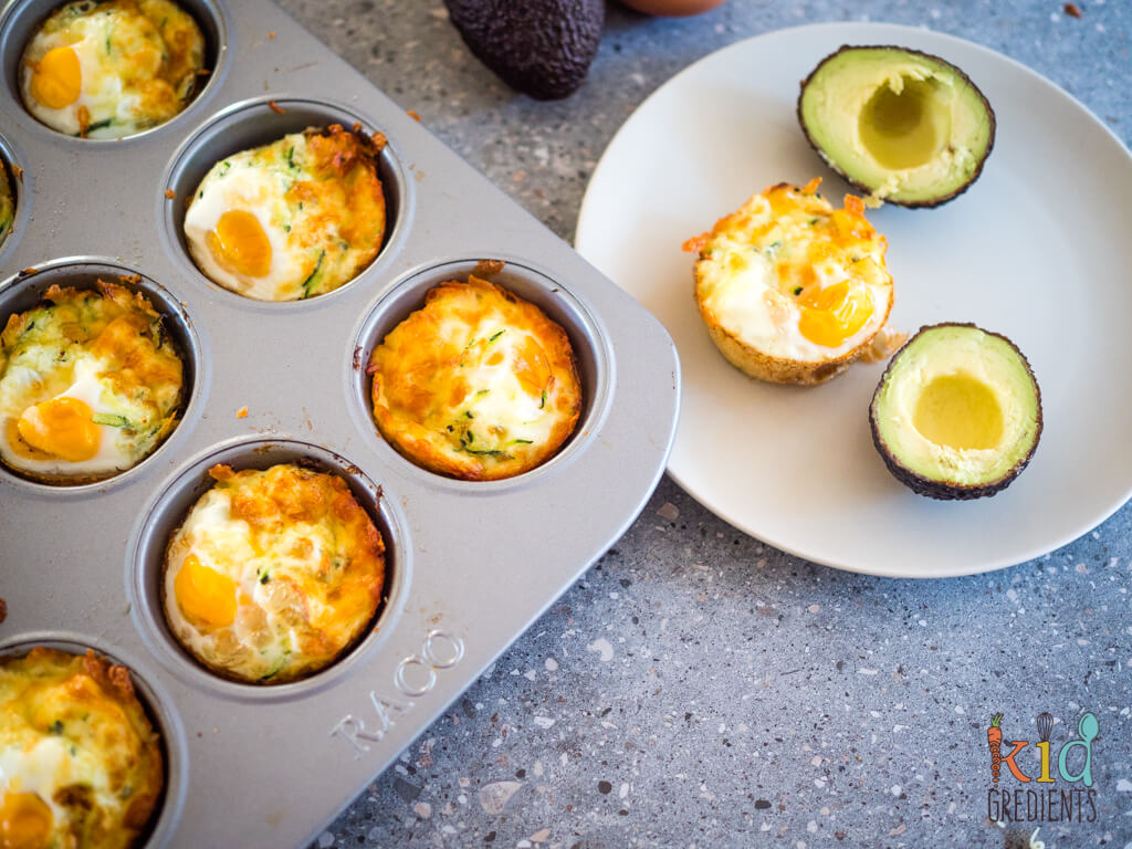 egg cup on the plate and some still in the muffin pan