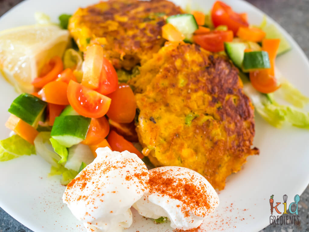 fritters on a plate with salad