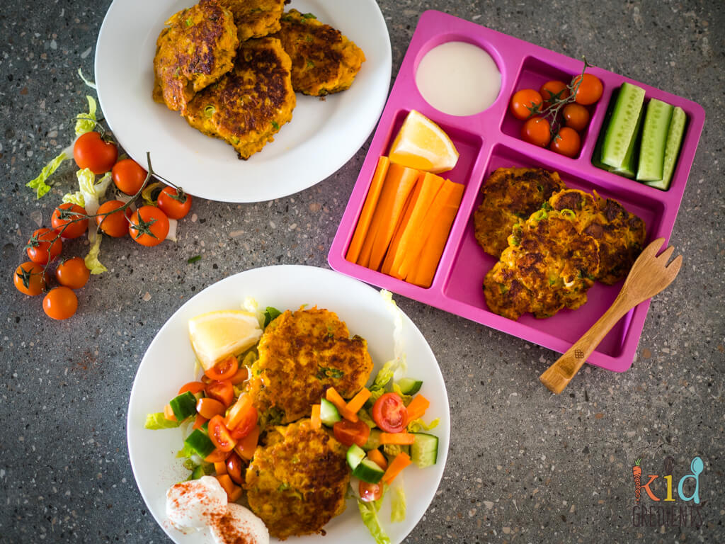 3 ways to serve fritters, just straight on a plate, with a salad for adults and with carrots, cucumber and cherry tomatoes and yoghurt dipping sauce.