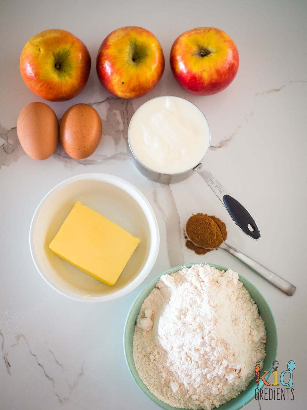 ingredients: self raising flour, apples, eggs, butter, cinnamon and yoghurt