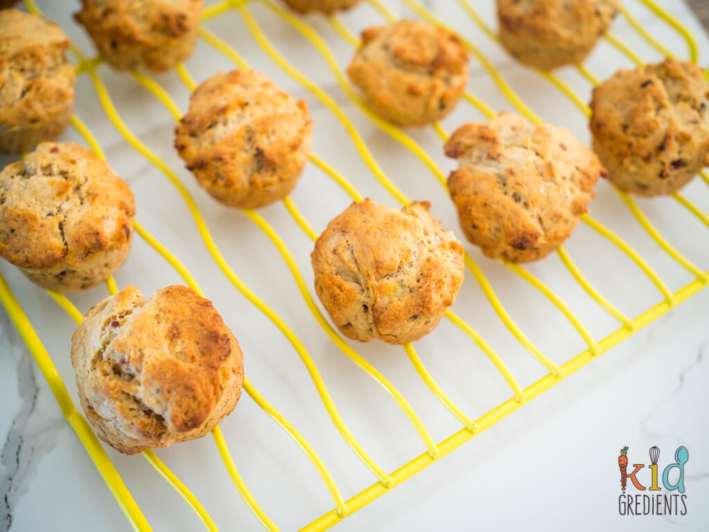 date and banana muffins on a yellow wire rack