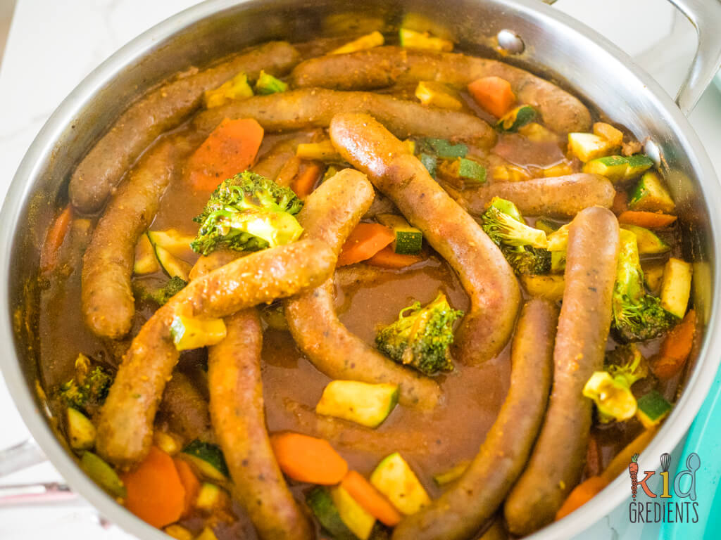 Curried sausages in the pan, at the end of cooking, loads of veggies!