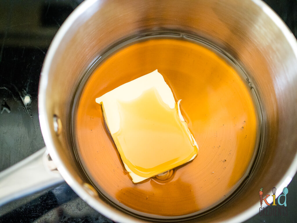 maple syrup and butter melting in a pan