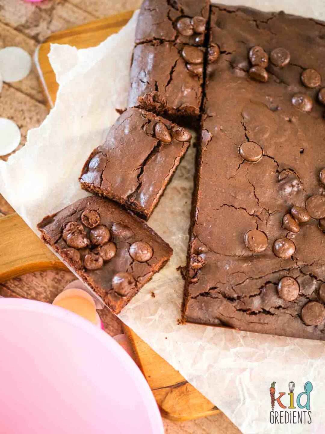 chocolate brownies, cut on a chopping board into squares