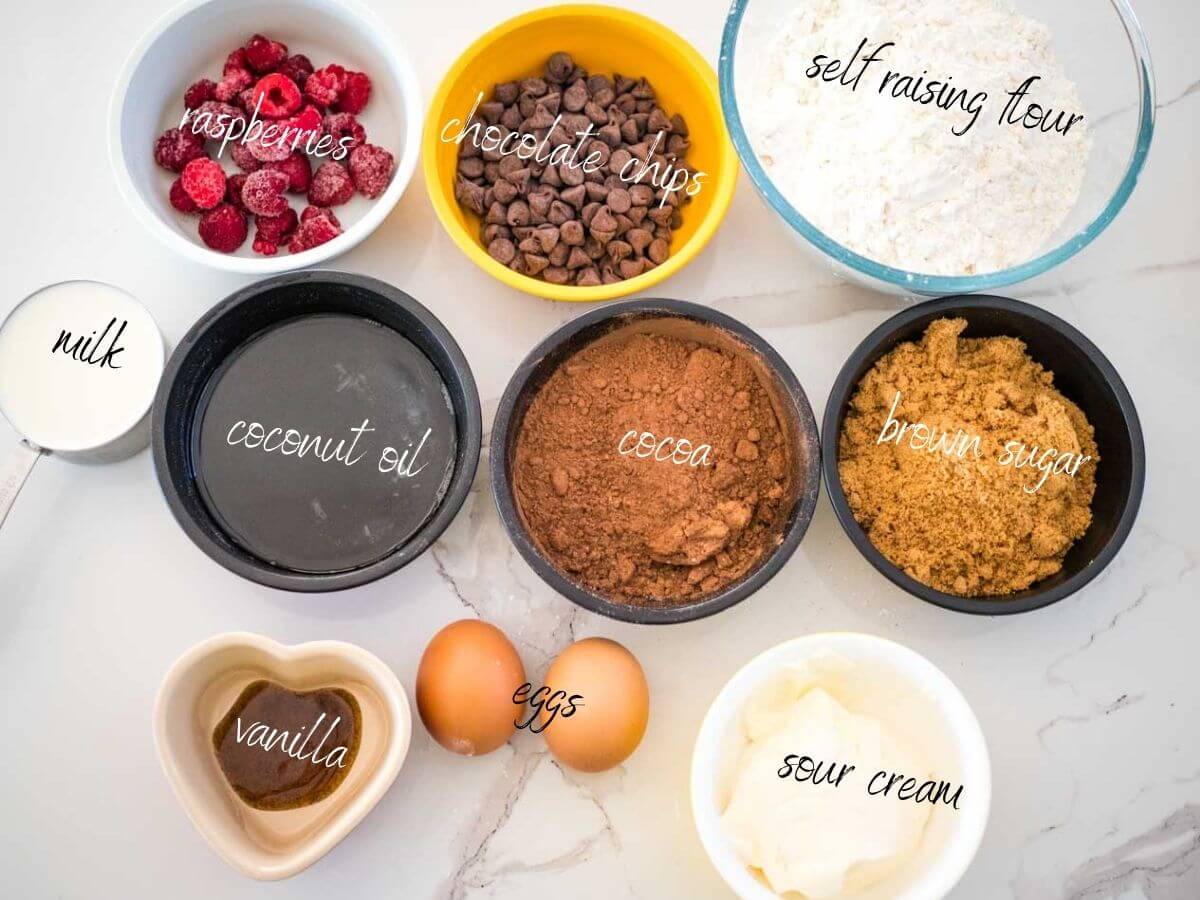 self raising flour, chocolate chips, raspberries, milk, coconut oil, cocoa, brown sugar, vanilla, eggs, sour cream.