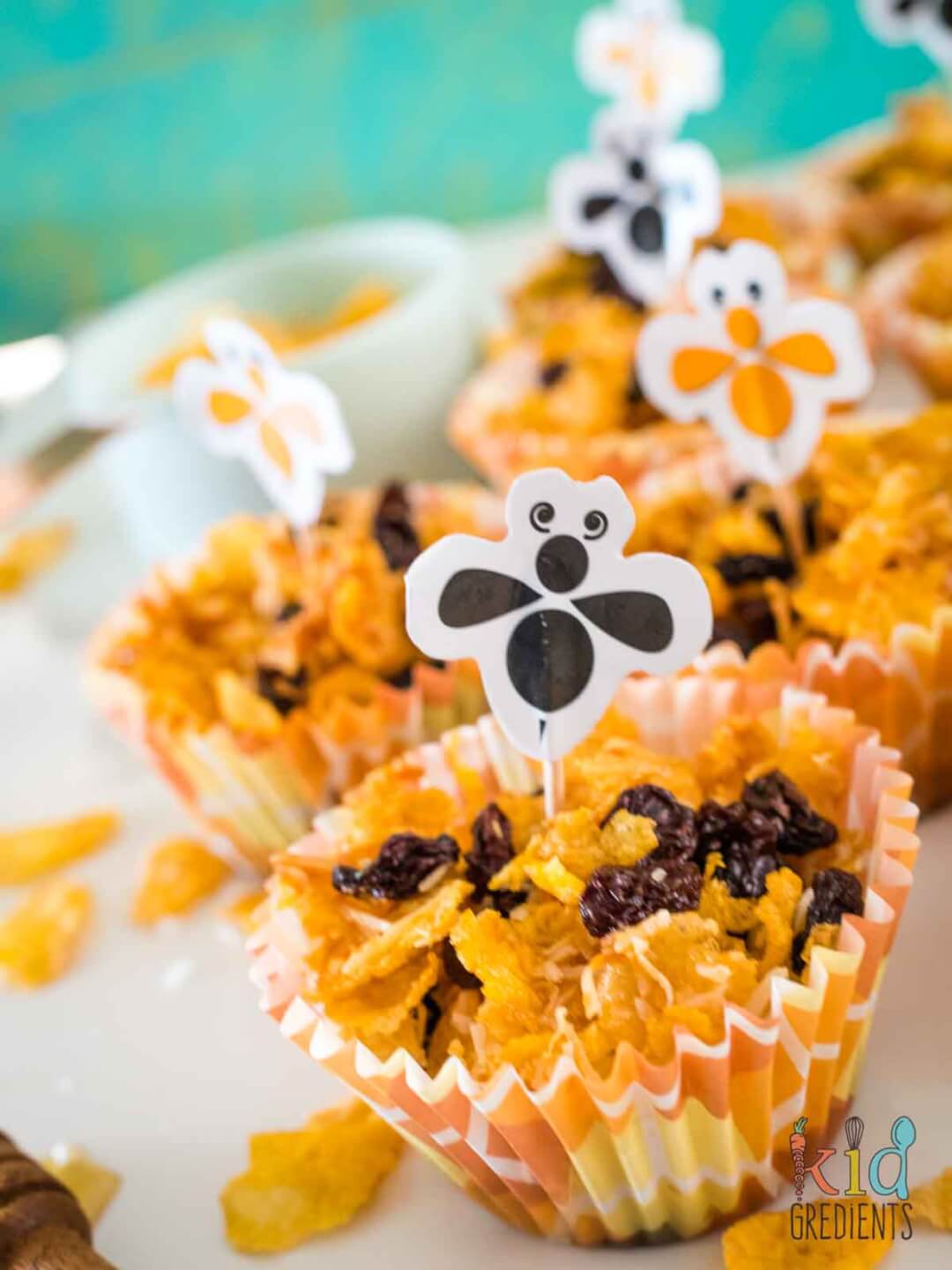 Healthier honey joys in beehive cupcake liners with bee cupcake picks
