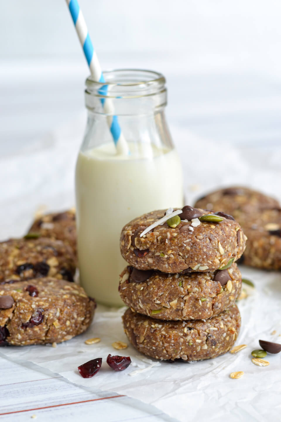 no bake trail mix cookies with a bottle of milk