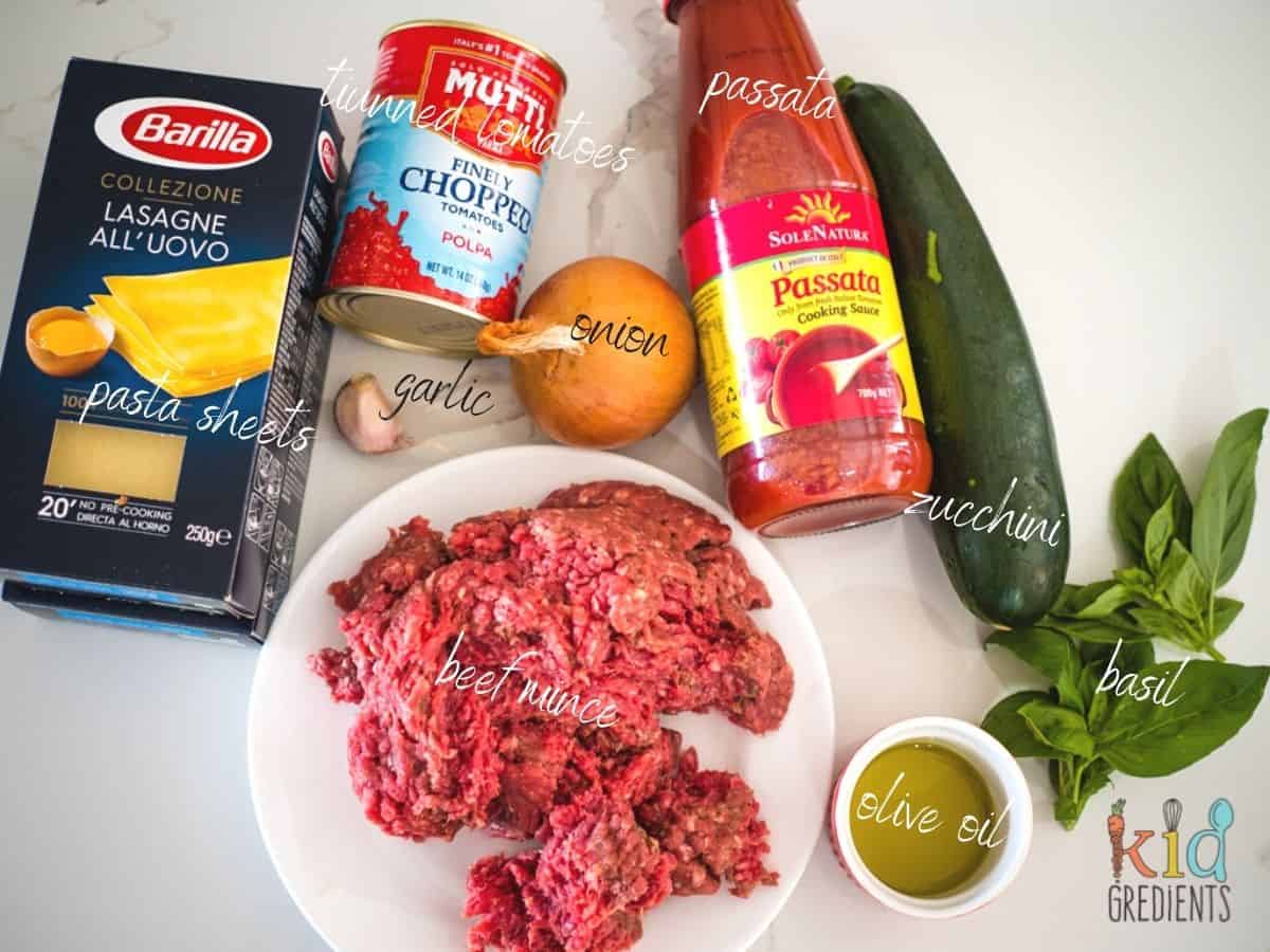 beef mince, passata, lasagne sheets, diced tomatoes, basil, zucchini, olive oil, onion and garlic