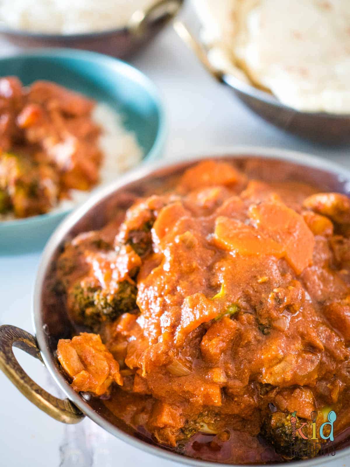 healthier butter chicken with vegetables in a balti dish