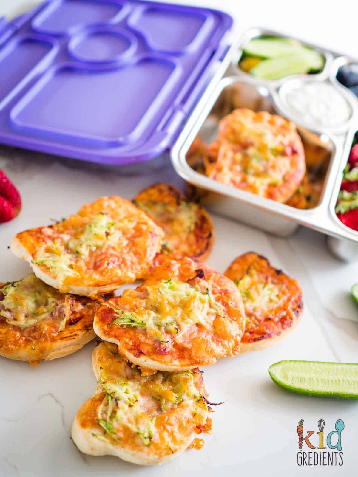 Lunchbox Mini Pizzas on the bench and in a lunchbox