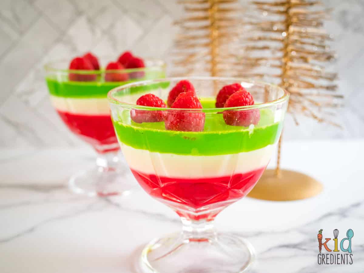 layered jelly in a glass ready to top
