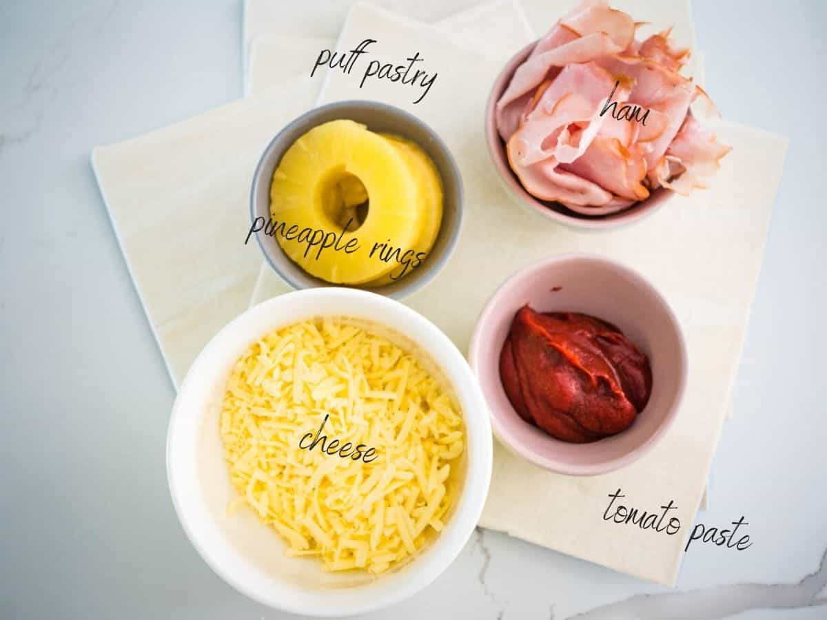 ingredients for Hawaiian Pizza Scrolls:  puff pastry, cheese, tomato paste, ham, pineapple